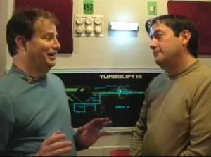 First Officer Brian Reigert and Lieutenant Commander Robert Shelton share an uncomfortable ride in a turbolift